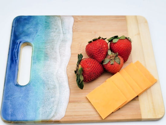 cutting board with ocean themed resin design